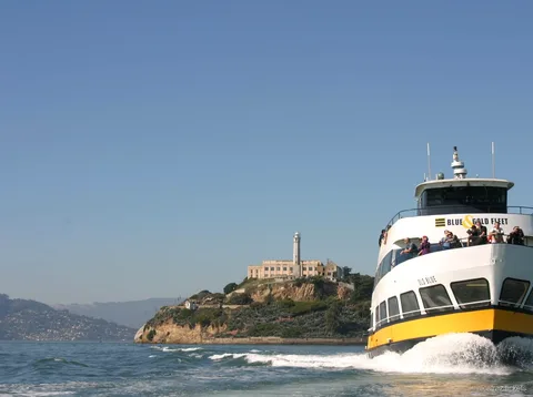 Sightseeing boat on the Alcatraz bay cruise circling the island